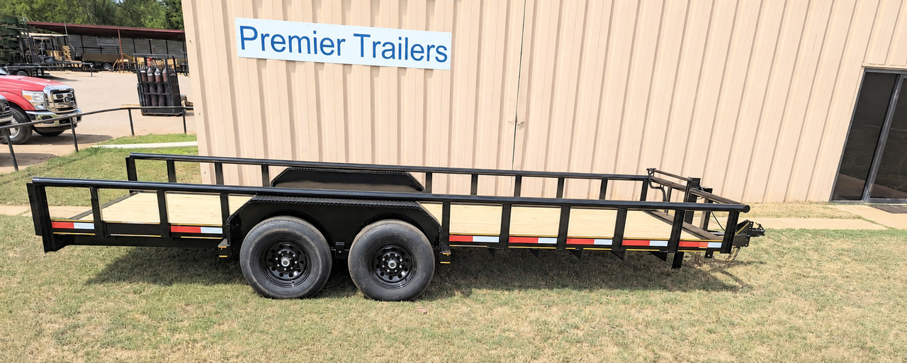 The Trailer Solution Wholesale Premier Trailers Custom Heavy Pipe Tandem Axle Utility Trailer with Slide In Ramps